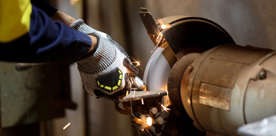 A picture of someone using a grinding wheel