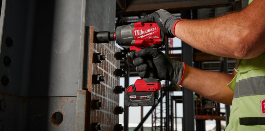 A picture of an impact wrench tightening large bolts