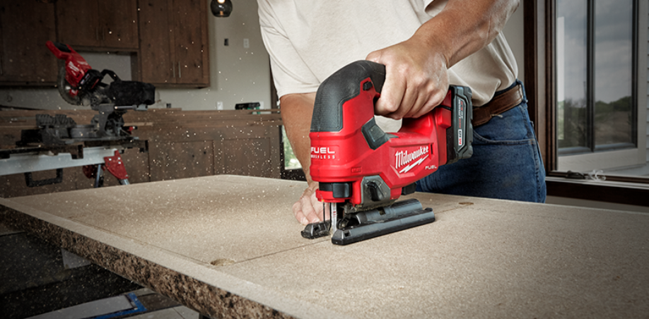 A picture of a Milwaukee M18 Fuel jigsaw cutting through a countertop